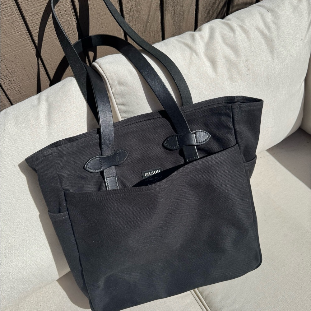 Filson black canvas tote with leather handle